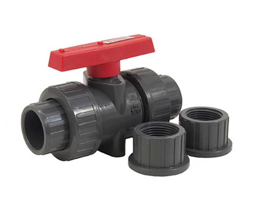 TS-703-1 - A gray PVC ball valve with a red handle is centered on a plain background. Two detached gray fittings lie beside it, showcasing assembly parts.