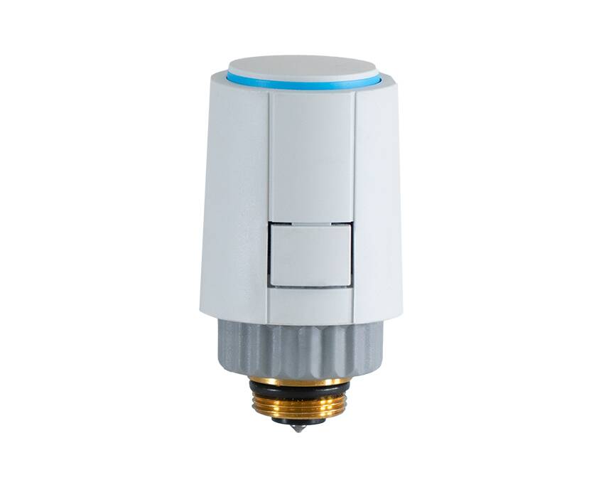 N.C.-Thermoelectric-Actuator-24V - A white smart radiator valve with a blue LED ring on top, featuring a cylindrical shape and metallic threading at the bottom, set against a white background.