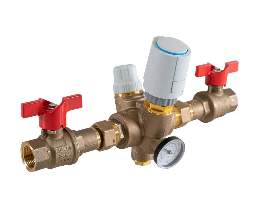 tb-150mg - A brass valve assembly with red handles and a pressure gauge on a white background. It includes a central white-cap valve, conveying a practical and industrial tone.